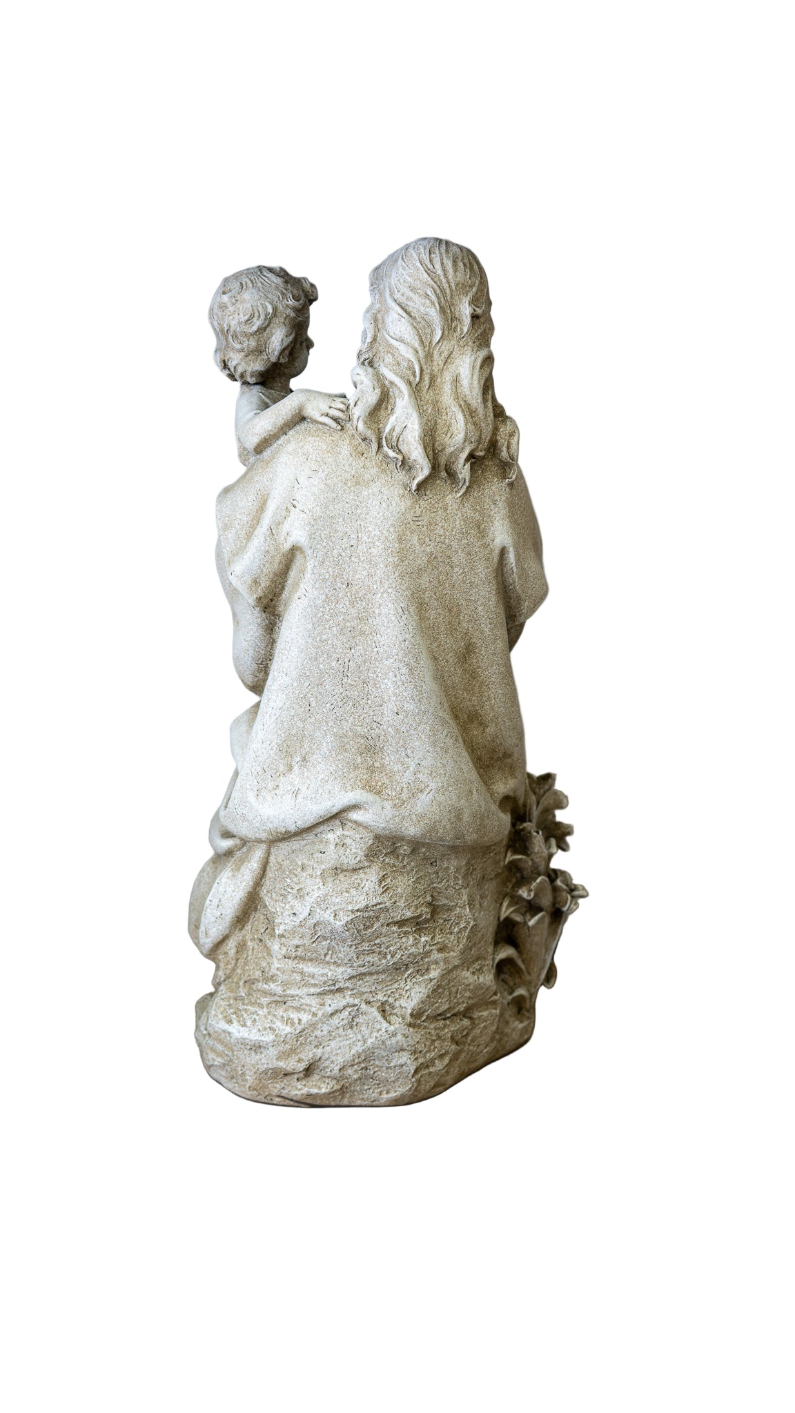Statue of a woman with a child on her shoulders on a beige shelf.